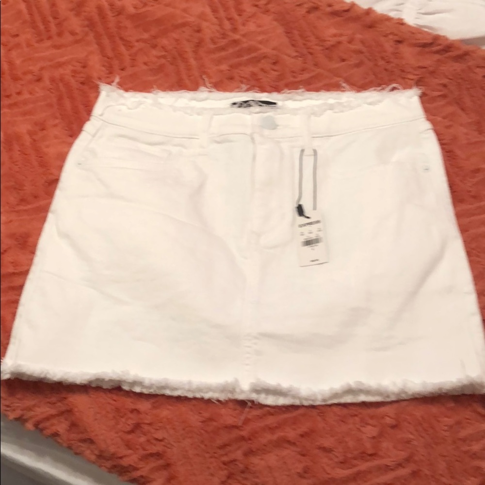 NWT Express white denim skirt with frayed hem.